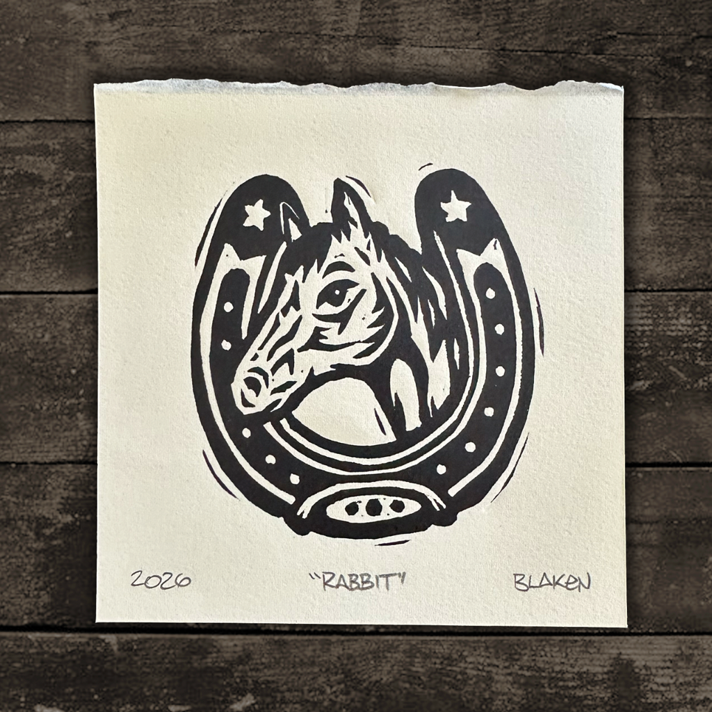 Black and white illustration of Lillian Smith's horse head in a horseshoe on a textured white background, with '2020', 'Rabbit', and 'Blaken' text.